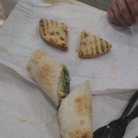 Peanut butter & banana flatbread and Hummus Veggie wrap at Tropical Smoothie Cafe in Destin