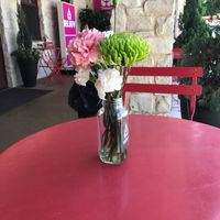 Cute and colorful outdoor seating at Rejuv Juice in Hurst