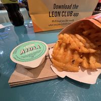 Waffle fries and aioli   at LHR - Leon - T2 in West London