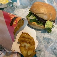 Veg burger and waffle fries    at LHR - Leon - T2 in West London