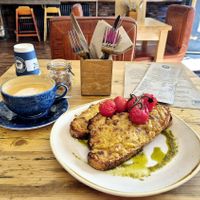 Vegan rarebit, grilled tomatoes and pesto. at Trading Post Coffee Roasters in Brighton