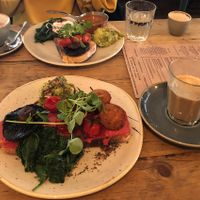 Vegan breakfast at the front, veggie breakfast at the back, ft. very tasty oat milk latte at Trading Post Coffee Roasters in Brighton