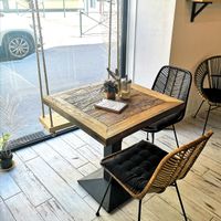 In the window, a swing in place of a chair! at Kia Ora in Annecy