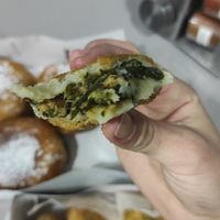Coxinhas com espinafres e chouriço at Capuchinho Verde in Porto