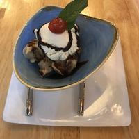 Banana fritters with vegan ice cream  at Kayal in Leamington Spa