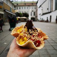 Dark chocolate ice cream (vegan), mango, crispy hazelnuts and strawberries. Waffel was made at the place and is also vegan. Very nice! at Kurt in Innsbruck