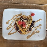 Peanut Butter Jelly Pancakes  at Hustle n' Flow Eatery in San Pedro De Alcantara