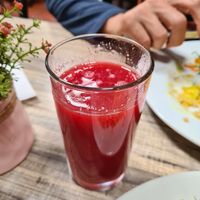 Juice with menu at Verde Vital in Bogota