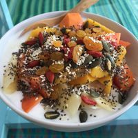 Coconut yogurt bowl with fruit, seeds and dried fruit.  at Joy of Life in Koh Phangan