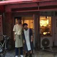 The cafe owners and front of cafe at Hobodo Cafe in Kyoto