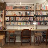 Cozy indoor setting with lots of books at Hobodo Cafe in Kyoto