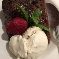 Lovely chocolate cake with dairy free vanilla ice cream!! Mmmm so tasty! at The Swan Inn in Lyndhurst