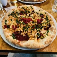 V for vegan pizza option  at Dough Pizza in Bath