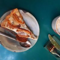 Cake and cappuccino at Eden Bistro in Warsaw