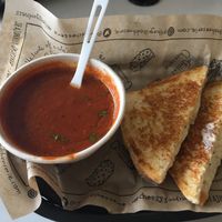 Vegan grilled cheese on sourdough and roasted red pepper + tomato soup  at The Grilled Cheeserie in Nashville