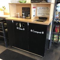 Recycling and compost center with sauces. at The Grilled Cheeserie in Nashville