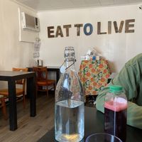 Five two-tops inside small dining room  at Vegelicious in Nashville