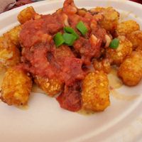 Tots have a salsa and cheese sauce! at Vegelicious in Nashville