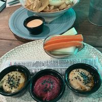 Starters of mixed hummus & Patatas Bravas   at Amarre 69 in Barcelona