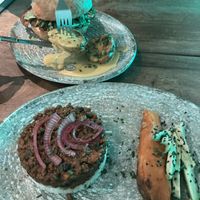 Chilli, rice, sweet potato & avocado. Chic’n burger & baked potato   at Amarre 69 in Barcelona
