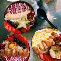 Yellow and pink smoothie bowls!  at Rainbowls in Amsterdam