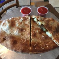 Vegan eggplant calzone with homemade tomato sauce  at Zia Gourmet Pizza in San Diego