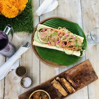 vegan banh mi baguette and eggplant fries, partly lava charcoal smoothie on the left at Musa Cookery in 
