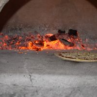 PIZZA CHORIZO VEGANA EN HORNO DE LAÑA. at Manso Pizzeria in Barcelona
