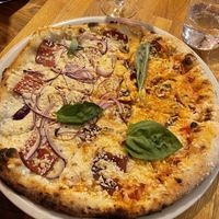 (Left) carbonara / Luna 4 vegan cheese (right)   at Manso Pizzeria in Barcelona