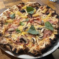 Hawaiian and cheese pizza  at Manso Pizzeria in Barcelona