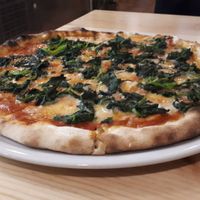 Spinach pizza at Manso Pizzeria in Barcelona