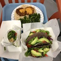 Faux fish cakes, almond mock seafood wrap & tacos w 3 different proteins. at Vegan Flava Cafe in Chapel Hill