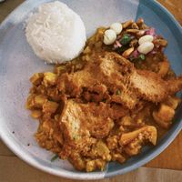 Carapulcra con chicharrones veganos  at Los Andenes Vegan in Madrid