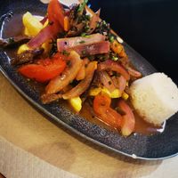 Lomo salteado at Los Andenes Vegan in Madrid