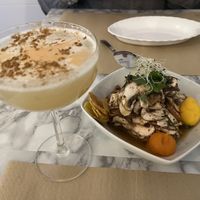 Pisco sour y ceviche  at Los Andenes Vegan in Madrid