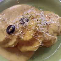 Patatas a la huancaína at Los Andenes Vegan in Madrid