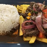 Lomo Saltado at Los Andenes Vegan in Madrid