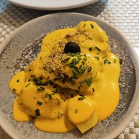 Papa a la huancaína at Los Andenes Vegan in Madrid