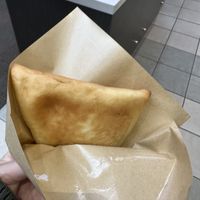 Spinach pie from bread bites   at Meridian Township Farmers' Market in Okemos
