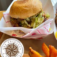 FOOLED PORK 
jackfruit, spicy prickly pear bbq sauce, coleslaw, fried pickle chips, potato bun  at Beaut Burger in Tucson