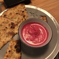 red hummus (a bit watery) & garlic bread (very oily/ dripping & partly burnt) at Stripped Pizza - Talacker in Zurich