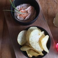 starter: vegan cheese made of cashews and chips at SOIL Vegan Cafe - West in Amsterdam