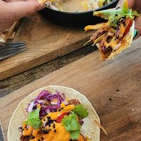 Mango ceviche and pulled jackfruit tacos at SOIL Vegan Cafe - West in Amsterdam