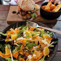 Reuben burger and salmon salad at SOIL Vegan Cafe - West in Amsterdam