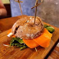 Salmon burger at SOIL Vegan Cafe - West in Amsterdam