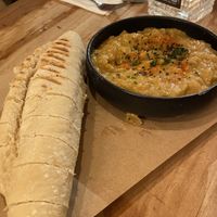 Aubergine dip with bread  at SOIL Vegan Cafe - West in Amsterdam