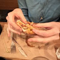 Remains of a chicken sandwich   at SOIL Vegan Cafe - West in Amsterdam