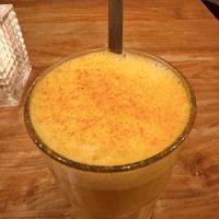 Turmeric latte  at SOIL Vegan Cafe - West in Amsterdam
