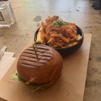 Chezy burger and kimchi fries  at SOIL Vegan Cafe - West in Amsterdam