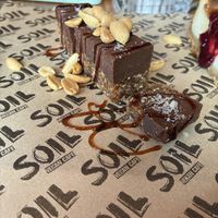 Snickers cake  at SOIL Vegan Cafe - West in Amsterdam